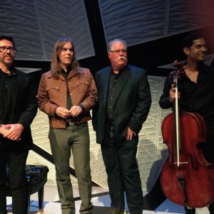 Chernoff, second from right, at the concert November 10. He is pictured on stage with, from left, composer Felipe Perez Santiago, composer Graham Reynolds, and cellist Jeffrey Zeigler.