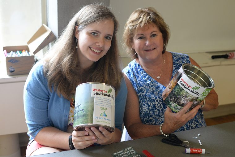 Several Wesleyan employees use small containers to collect garbage. The "mini bins" encourage recycling and reduce the number of trash can liners used on campus.