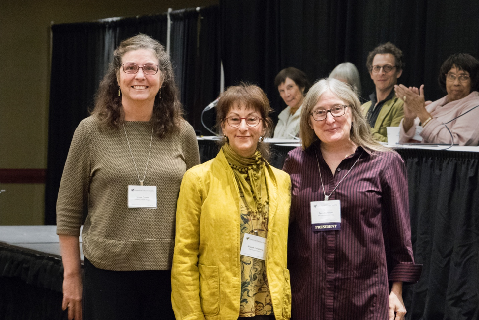 Past prize winner Maida Owens (left) and AFS President Dorothy Noyes present Maggie Holtzberg (center) with the 2018 Benjamin A. Botkin Prize at the Annual Meeting of the American Folklore Society in Buffalo, New York. Photo credit: Meredith A. McGriff.