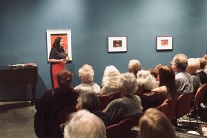 Victoria Smolkin discusses her new book at the art exhibition.