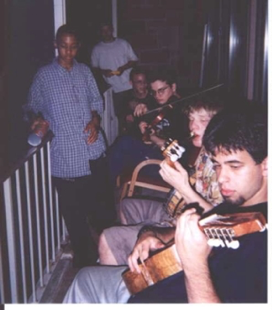 This particular night some of us gathered in front of the dorms. We are playing the cuatro (south American 'ukulele/guitar'), American banjo, violin, and tin can!” - Christopher Moscate, CCY ’98
