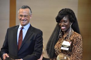 President Roth and Bozoma Saint John ’99 smile on stage.