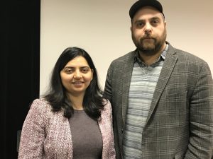 Visiting assistant professor Swapnil Rai stands beside her colleague from Boston College, alumnus Matt Sienkiewicz, who gave a guest lecture