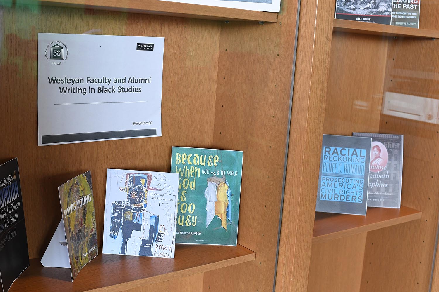 The "Books in Black Studies" exhibit, located in Daniel Family Commons, features several book covers by Wesleyan faculty and alumni authors. 