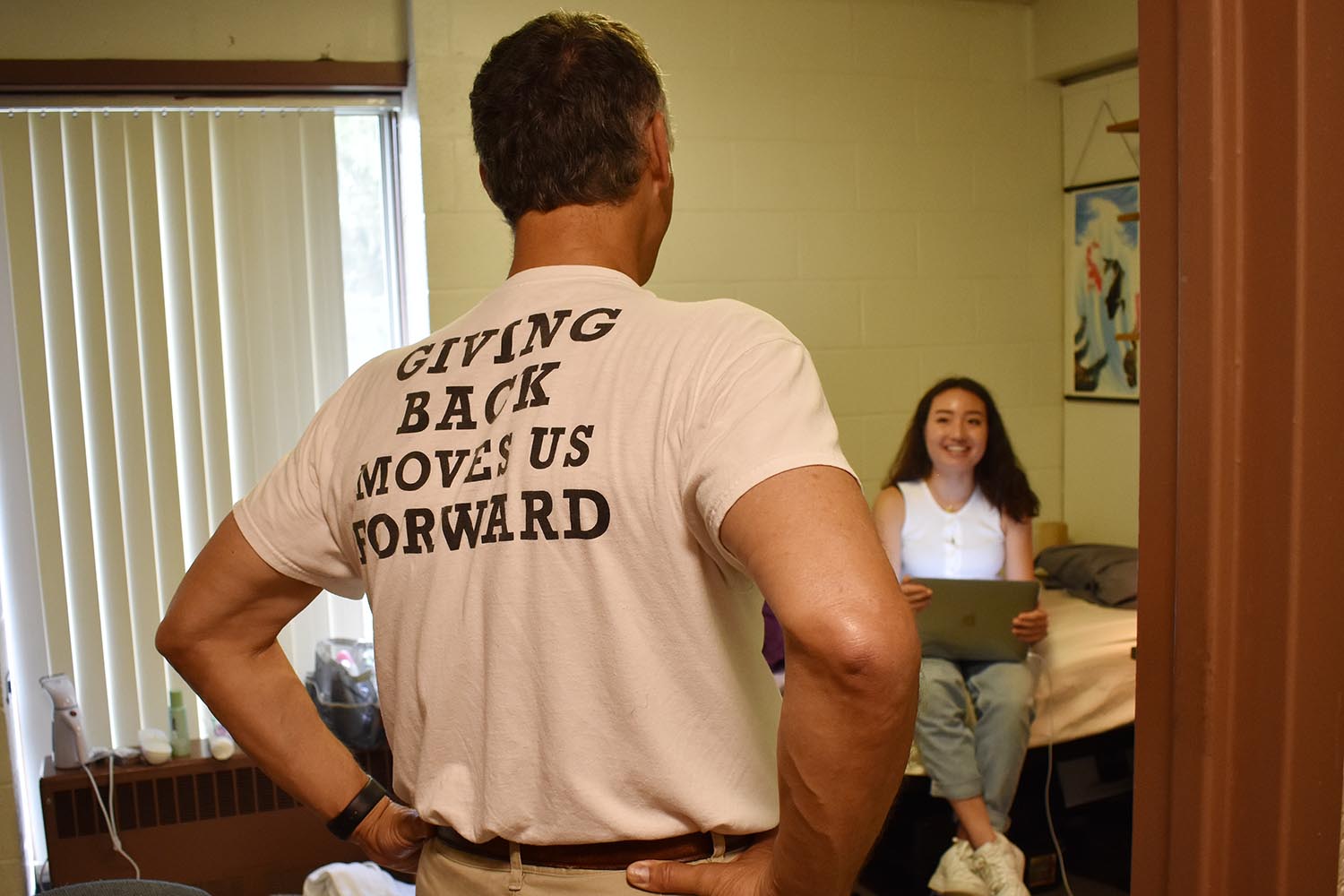 Wesleyan President Michael Roth speaks to Joline Cappo '23, who hails from Shanghai. Cappo arrived with international students earlier in the week. She notes that while she applied to Wesleyan thinking she’d be a psychology major, she’s undecided and looking forward to exploring. “I can experiment,” she said.