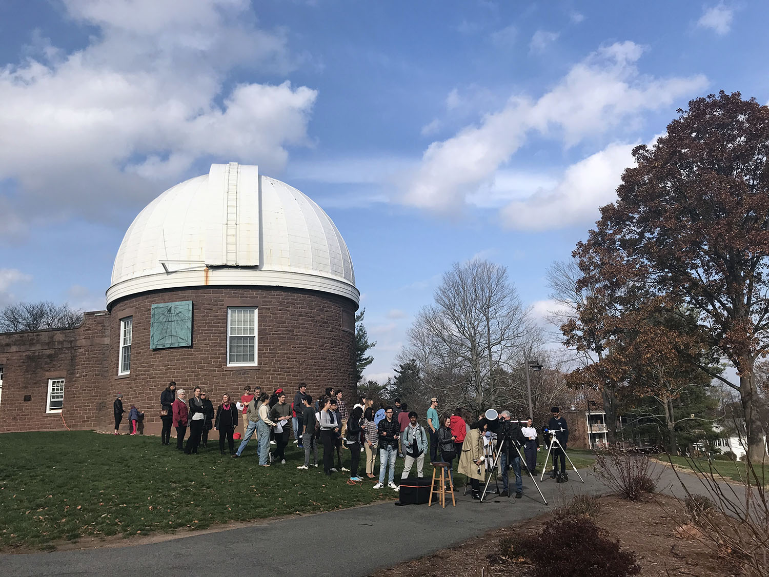 Visitors use telescopes outside observatory