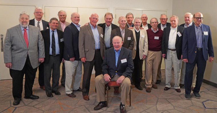 The football players at the 2019 Homecoming game, selected from the 1960s teams.