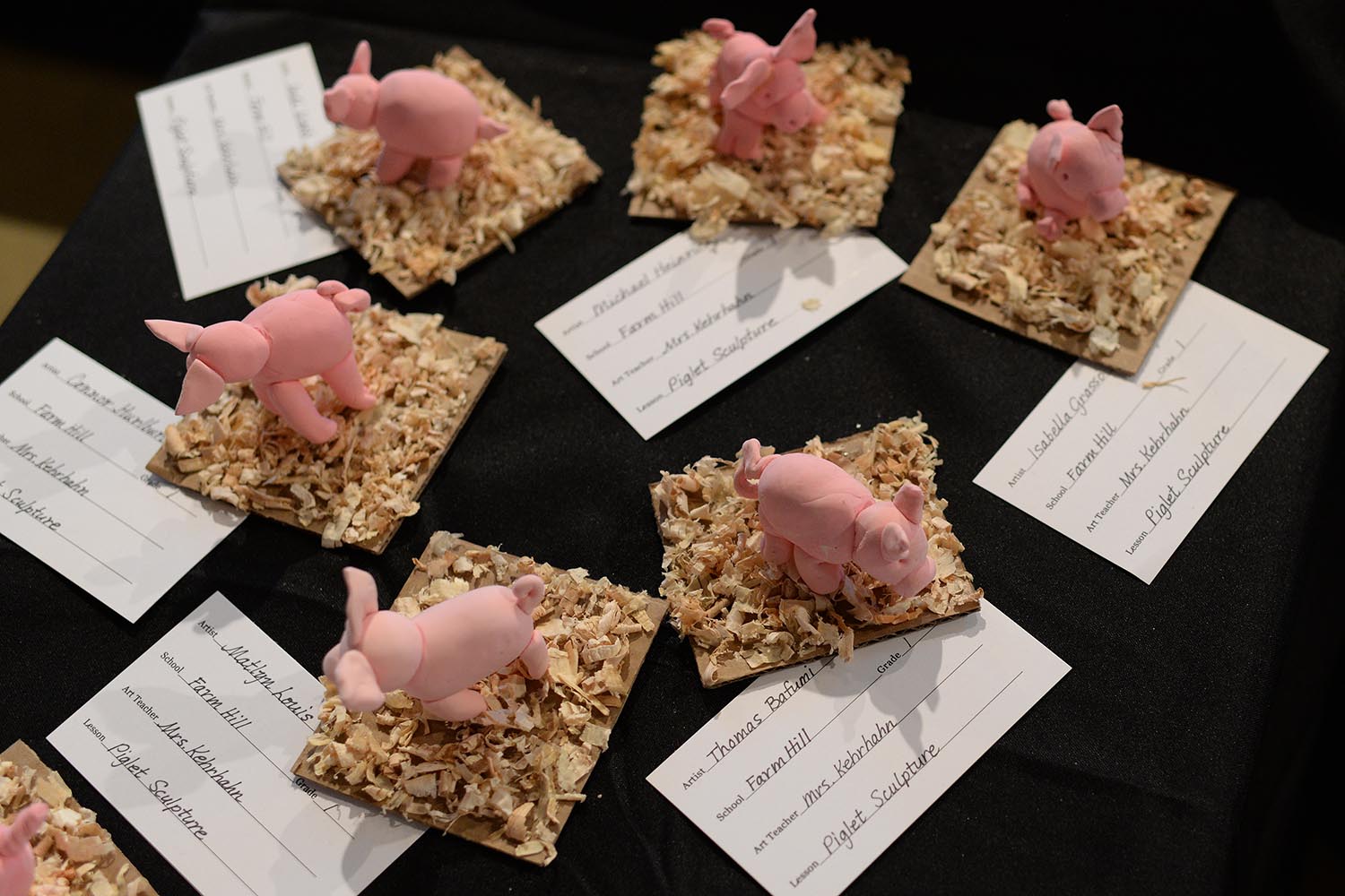 Several first-graders from Farm Hill Elementary School made piglet sculptures. 