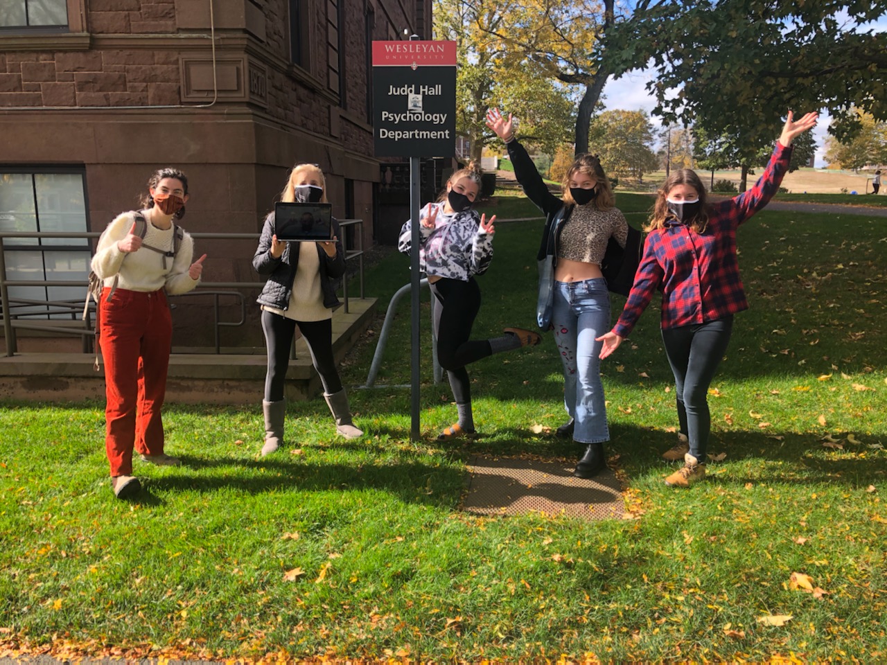 On Oct. 27 and Nov. 5, more than 100 students participated in an on-campus Psychological Scavenger Hunt created by Steve Stemler, associate professor of psychology, and Sarah Carney, assistant professor of the practice in psychology. Carney, pictured second from left, spoke with Stemler through Zoom during the event. 