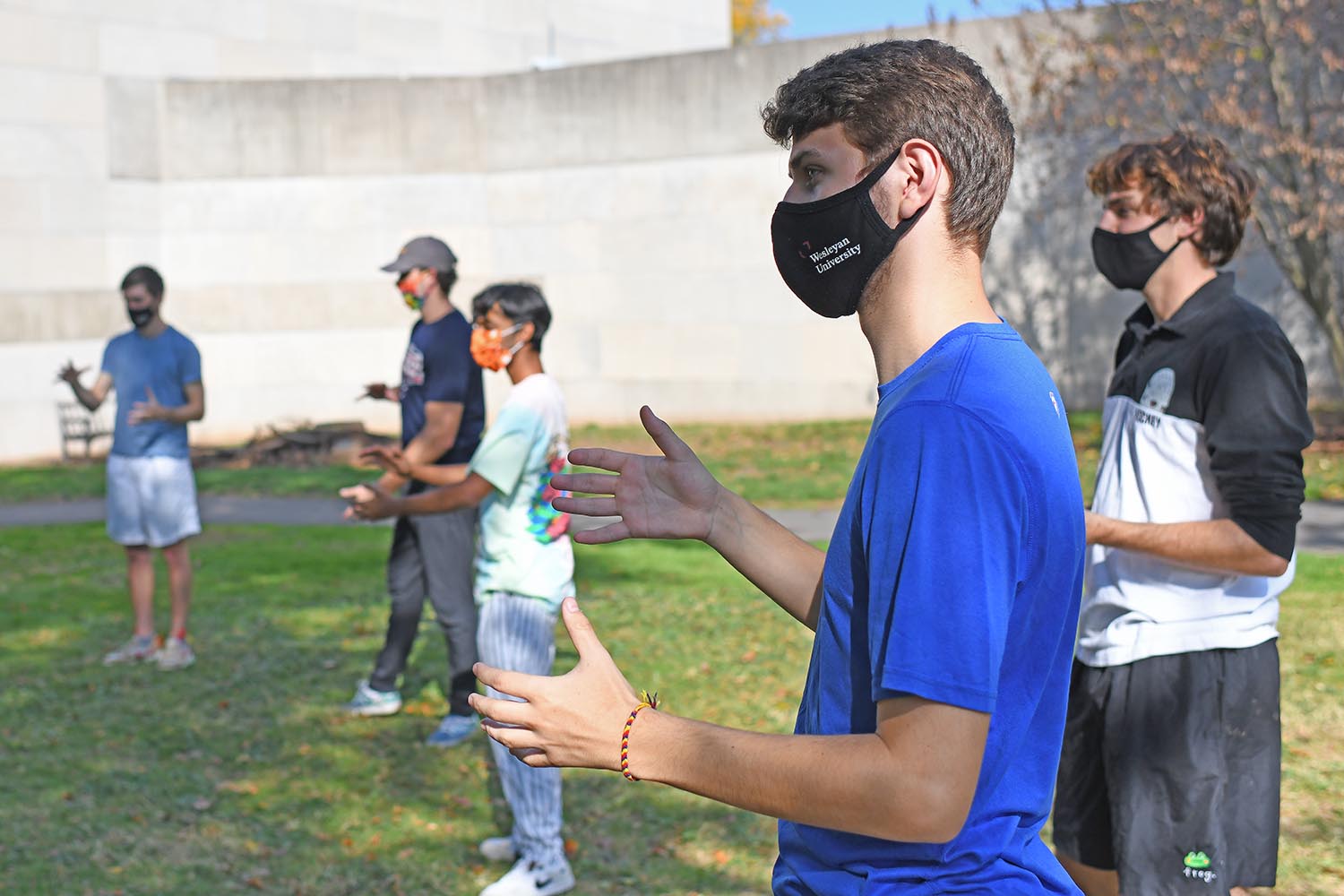 Haddad then broke the class into four groups and asked them to construct “movement phrases” based on their recent readings. Through this exercise, the students engaged with the topics emotionally rather than just intellectually and expressed all of that with their bodies. After performing their movement phrase, fellow classmates reflected on how they interpreted the movements.