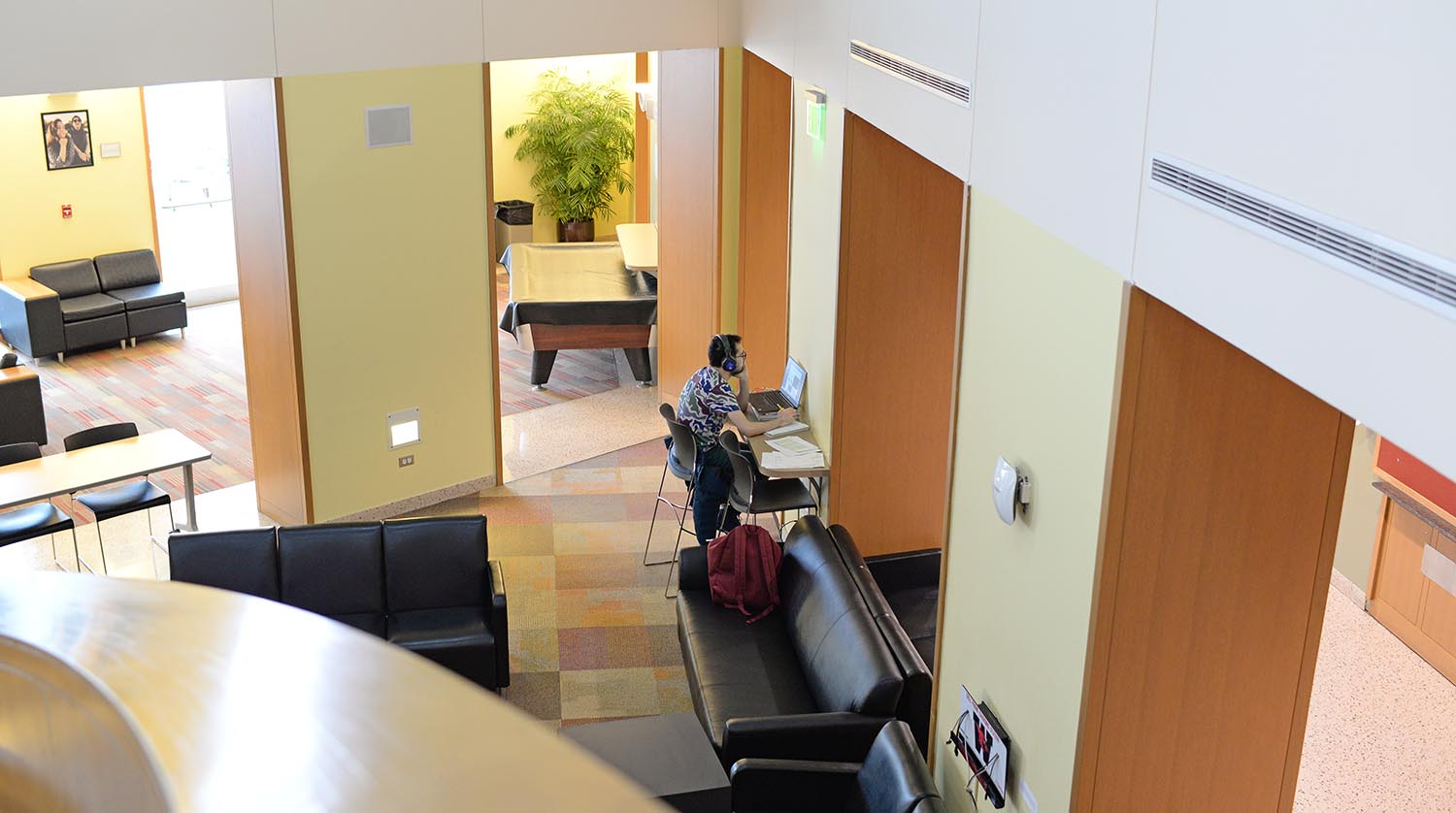 A student works in Usdan University Center on March 23. Approximately 300 students are staying on campus during the coronavirus pandemic. All students are completing their classes remotely due to concerns over the spread of the novel coronavirus (COVID-19), regardless of their physical locations. (Photos by Olivia Drake)