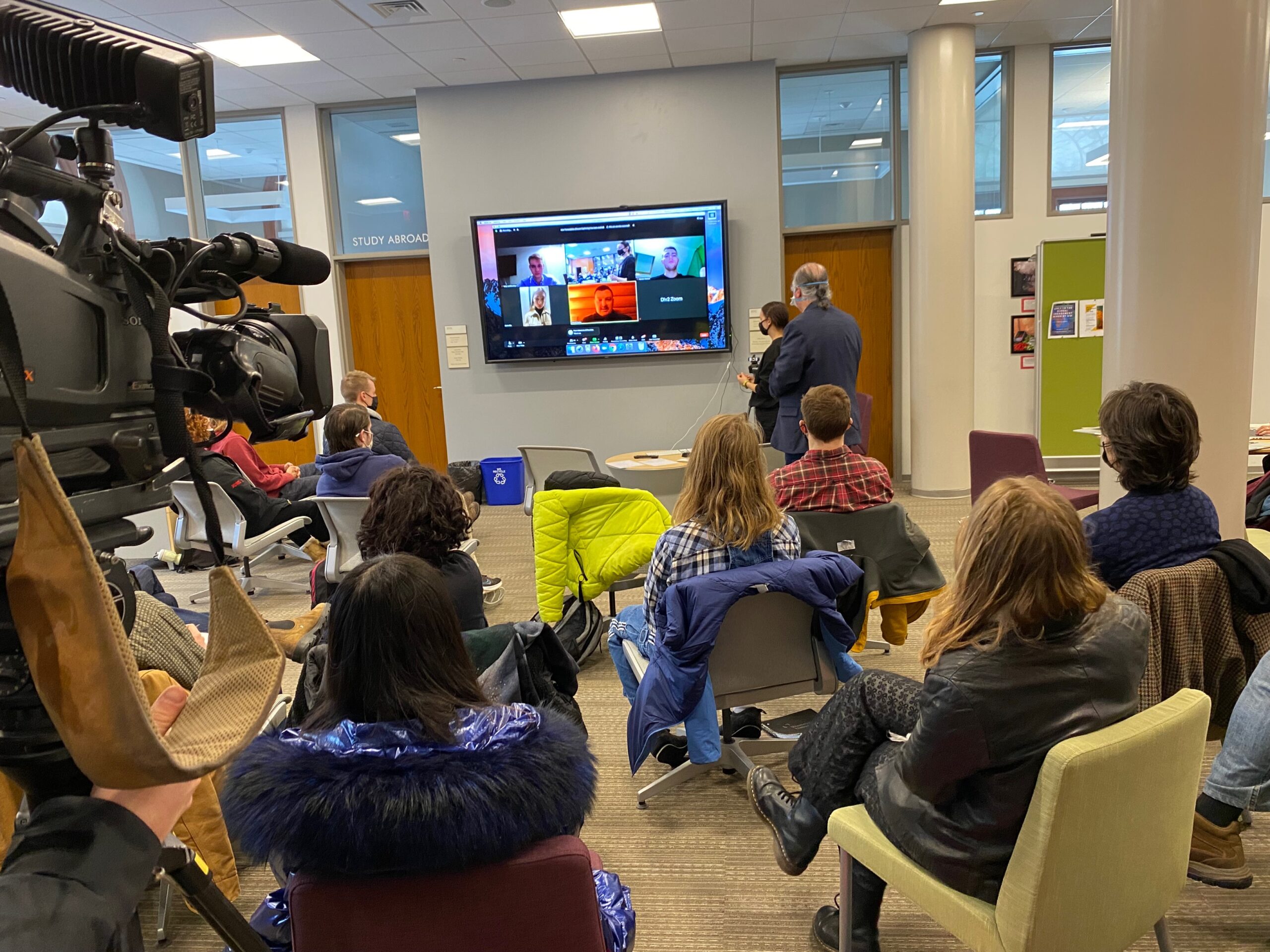 A room Wesleyan students watching a Zoom event from the Ukraine